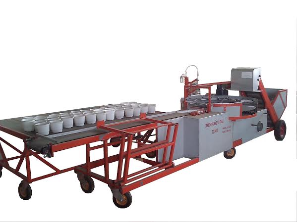 may dong dat vo chau pot filling machine 